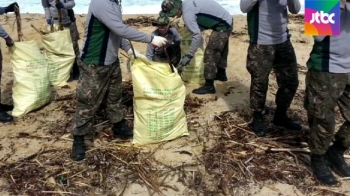 동해안 곳곳 북한 쓰레기 '홍수'…관광·수산업 차질도