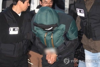 '여관 방화 참변' 피의자, 종로서 유치장에 입감…'묵묵부답'