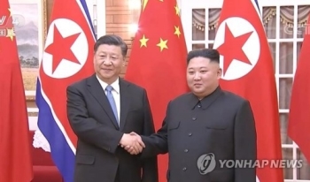 김정은·시진핑 “북중관계 더 발전해야 지역 평화·안정에 유리“