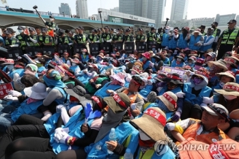 톨게이트 수납 노조원들, 출근길 경부선 TG진입로 2시간 점거