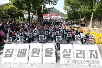 전국집배노조 “정규직 늘리고 토요 택배 폐지해야“…삭발투쟁도