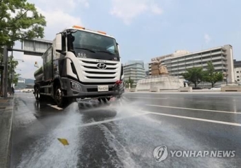 '한증막' 된 도심…폭염에 무방비 노출된 실외노동자들