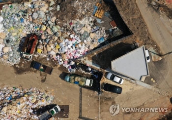 투기 의혹 시의원·공무원 집·사무실 동시다발 압수수색