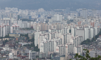 '일시적 2주택자·장기보유자' 종부세 완화법 국회 본회의 통과