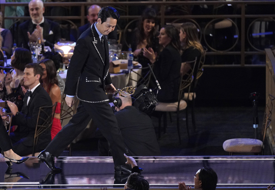 Lee Jung-jae accepts the Emmy for outstanding lead actor in a drama series for &#34;Squid Game&#34; at the 74th Primetime Emmy Awards on Monday, Sept. 12, 2022, at the Microsoft Theater in Los Angeles. (AP Photo/Mark Terrill) 091222128375    〈저작권자(c) 연합뉴스, 무단 전재-재배포 금지〉