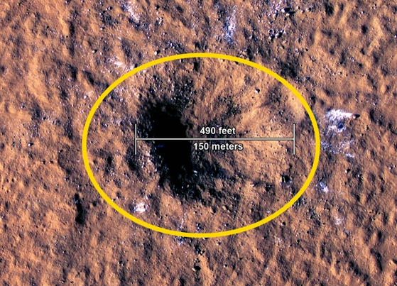 화성 표면에 생긴 운석 충돌구. 〈사진=NASA 제공〉