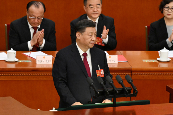 시진핑 중국 국가주석이 13일 오전 베이징 인민대회당에서 열린 전국인민대표대회 제14기 1차 회의에서 폐막 연설을 하고 있다. 〈사진=로이터〉