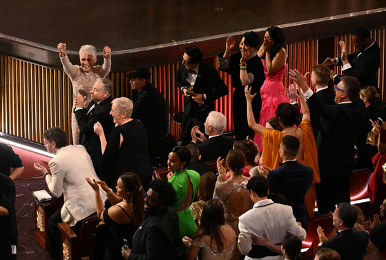 celebrates after winning the Oscar for Best Picture for ″Everything Everywhere All at Once″ during the 95th Annual Academy Awards at the Dolby Theatre in Hollywood, California on March 12, 2023. 〈사진=연합뉴스·AFP 무단 전재 재배포 금지〉