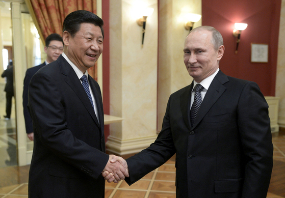 시진핑 중국 국가주석(왼쪽)과 블라디미르 푸틴 러시아 대통령. 〈사진=로이터 연합뉴스〉