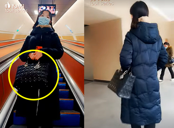 평양 지하철을 소개하는 영상에서 유미는 크리스챤 디올의 '레이디백'과 비슷해 보이는 가방을 손에 들고 등장했다.〈사진=유튜브 캡처〉